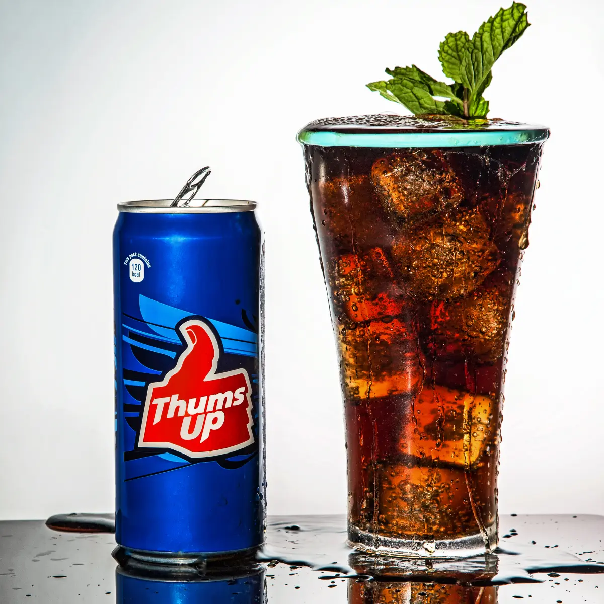 Thums Up Soda Can Poured